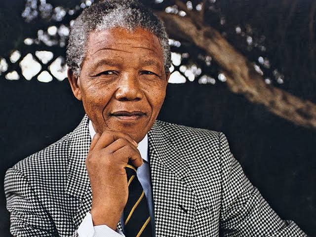 who was the first black president of south african